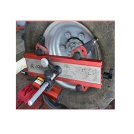 Laser wheel alignment