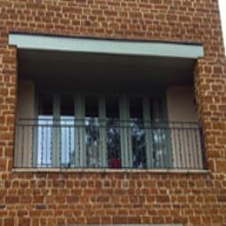 Glass Panel and Wood Balconies 