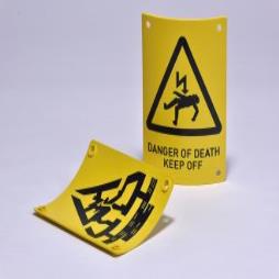 Self adhesive signs and labels