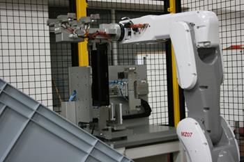 APPLICATIONS: Robot De-moulding & Assembly cell		