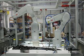 APPLICATIONS: Six Axis Robot Clipping & Welding System
